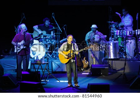 ISTANBUL,TURKEY - JULY 19 : Paul Simon and his band perform at Cemil Topuzlu Open Air Theater on July 19, 2011 in Istanbul, Turkey