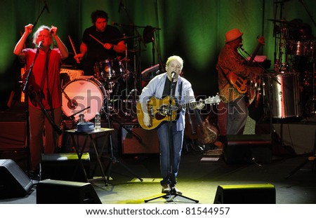 ISTANBUL,TURKEY - JULY 19 : Paul Simon and his band perform at Cemil Topuzlu Open Air Theater on July 19, 2011 in Istanbul, Turkey