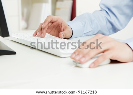 Human hands working on the computer