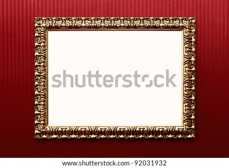 Blank vintage gold frame over striped wallpaper with clipping pa