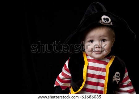 Baby  Halloween Costumes on Adorable Baby Boy In A Pirate Costume For Halloween On A Black