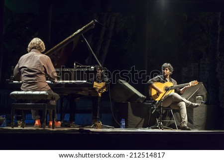 ALMUNECAR, SPAIN - JULY 19, 2014: Chano Dominguez, piano, and Nino Josele, guitar, at XXVII International jazz festival of Almunecar, during their concert