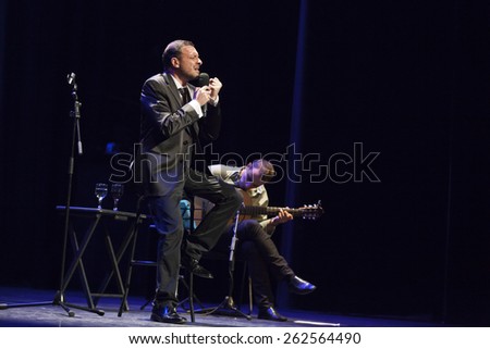 GRANADA - SPAIN, MARCH 15, 2015: XXVII International Tango Festival. Luis Filipelli (guitar and singer).
