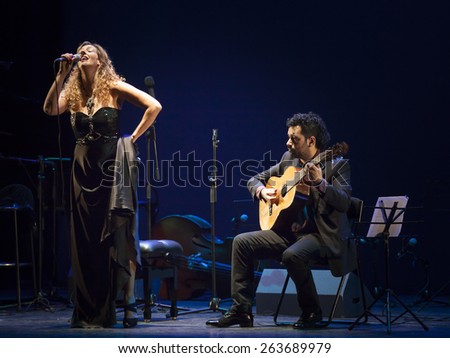 GRANADA - SPAIN, MARCH 14, 2015: XXVII International Tango Festival. Sandra Marquez, singer, Javier Diaz, guitar, and Guido Lago, harmonic.