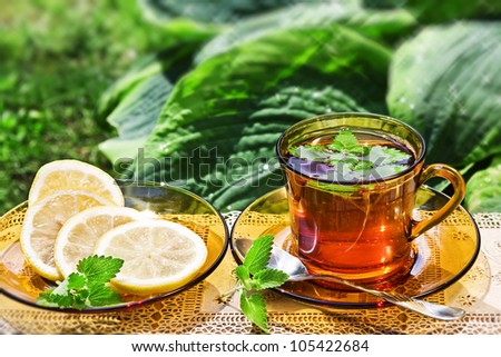 Cup tea with mint and lemon
