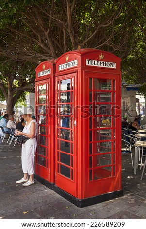 Gibraltar,  British Overseas Territory - JULY 11, 2013: The red telephone box, a telephone kiosk for a public telephone designed by Sir Giles Gilbert Scott.