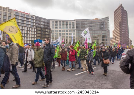GERMANY BERLIN - JANUARY 17: Thousands of people protest against industrial barns, where animals are in sufferable conditions on January 17, 2015  in Berlin. There started International Green Week.