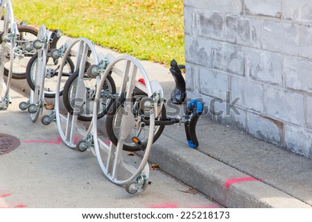 Unicycles with training wheels
