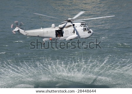 An Australian navy sea king helicopter practising a rescue