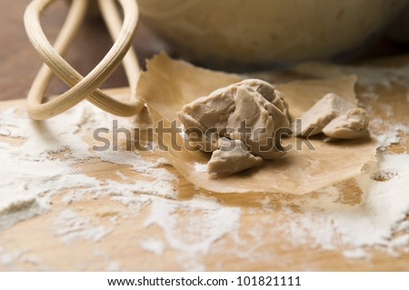 Baker\'s yeast on wooden board