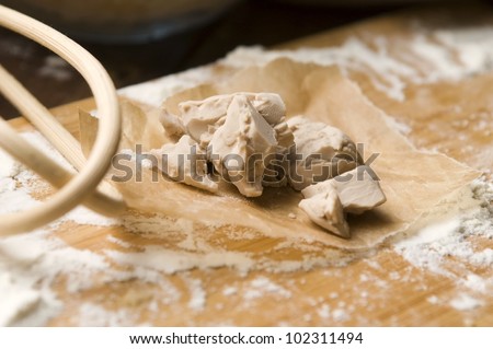 Baker\'s yeast on wooden board