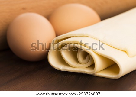 homemade dough on a wooden board