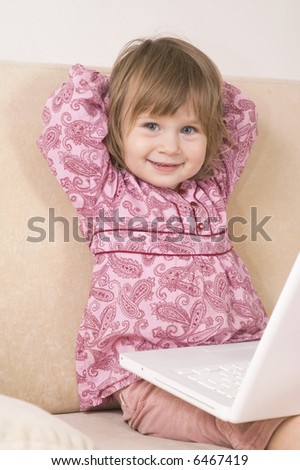 young girl using a laptop. computer generation