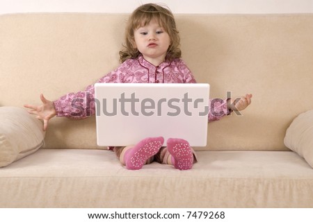young girl using a laptop. computer generation
