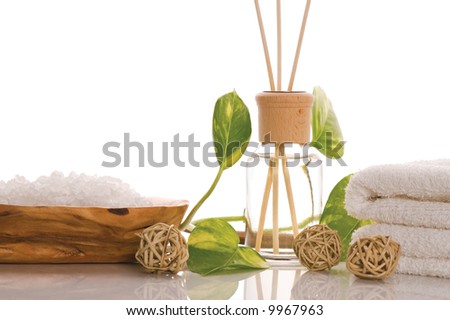 aroma therapy objects. bottle of esential oil, bath - salt, towels