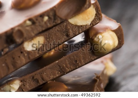 Pile of broken chocolate with nuts