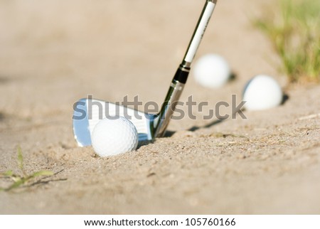 Golf Ball in Trap with Sand