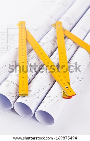 rolls of architectural projects and ruler