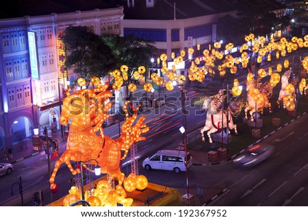 SINGAPORE - JAN 14: Chinese New Year with horse-themed decorations in New Bridge Road, Chinatown on Jan 14, 2014 in Singapore. Design concept by Singapore University of Technology and Design (SUTD)