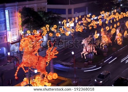 SINGAPORE - JANUARY 14: Horse lanterns displayed over South Bridge Road just before Chinese New Year Celebration for year of the Horse in Chinatown district of Singapore on January 14, 2014.