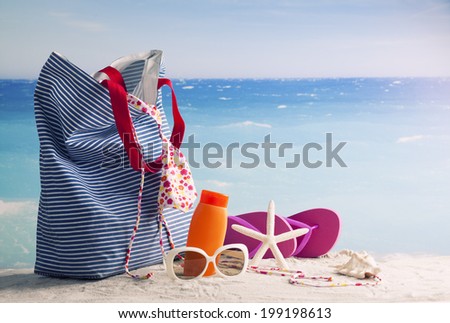 Beach bag with beach accessories, retro style