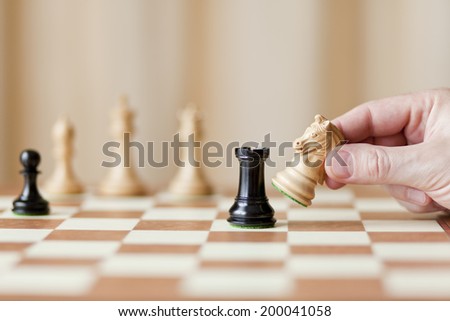 knight capturing rook, chess game