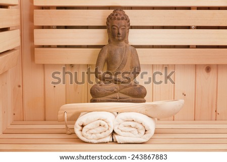 meditation and spa background in sauna with buddha statue