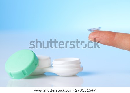 contact lens on finger and protaction case