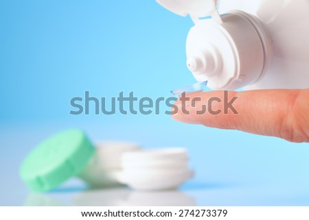 Contact lens, case and bottle of solution