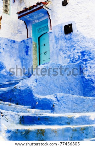 blue house and house wall
