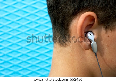 close up head-phones on teen