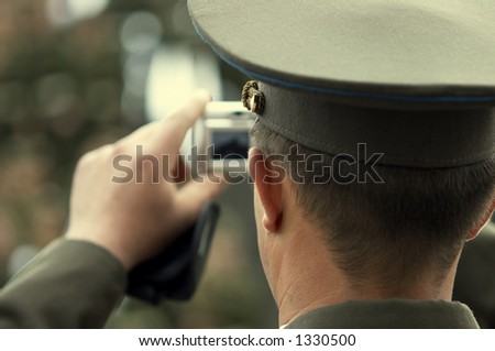russian officer with digital camera