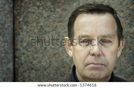 person shut one\'s eyes with empty space for text(special photo f/x with vignette,focus on the eyes)
