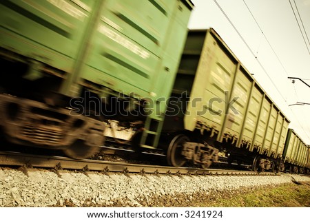 freight  train (special toned and blur-motion photo f/x, focus point on railroad embankment and rail)