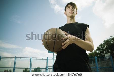 basketball outside (special toned photo f/x, focus point on ball,special vignetting)