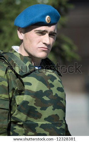 Russian paratrooper on Victory Day in Russia, editorial photo (focus point on face)