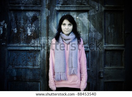 teen girl wearing second-hand clothing and living on the street
