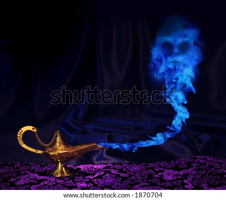 magic Aladdin genie lamp with genie arising from blue smoke