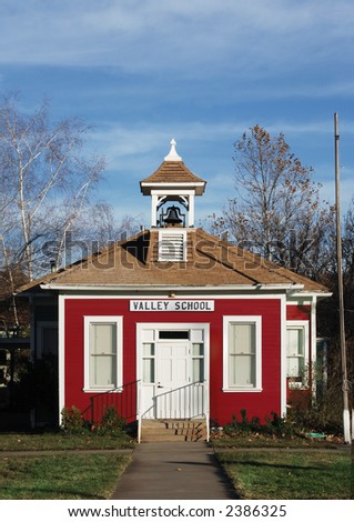 little red school house with bell tower