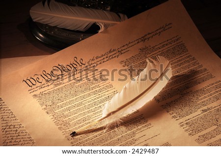 United States Constitution medium shot showing top half and quill pen
