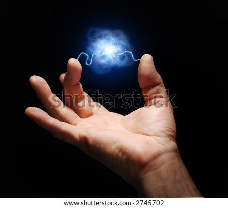 male hand with electricity arcing between thumb and middle finger with plasma ball suspended in the center