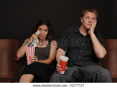 Couple on a date at the movies with a bored man and a crying woman