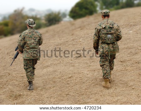 Two US Marines on patrol