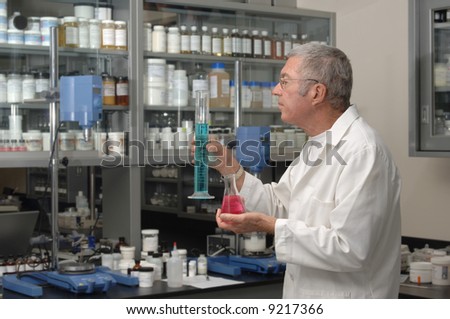 Senior chemist formulating in a laboratory