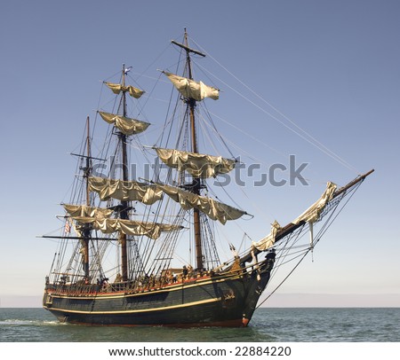 Pirate style ship setting sail on the high seas