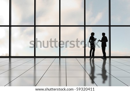 Profiles of two business people against a bank of windows in an office tower