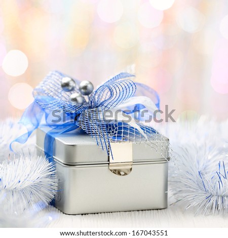 Closeup of christmas gift box on abstract background