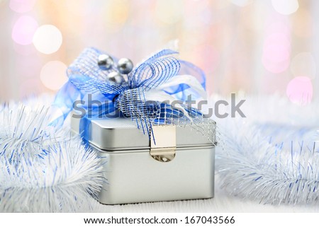 Closeup of christmas gift box on abstract background