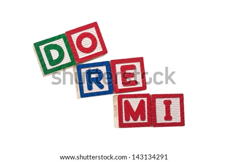 Wooden blocks forming the first three musical notes used in solfege isolated on white background