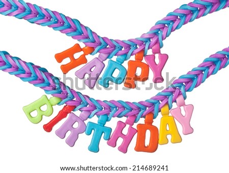 Bracelet formed using colorful rubber bands with the words HAPPY BIRTHDAY isolated on white background
